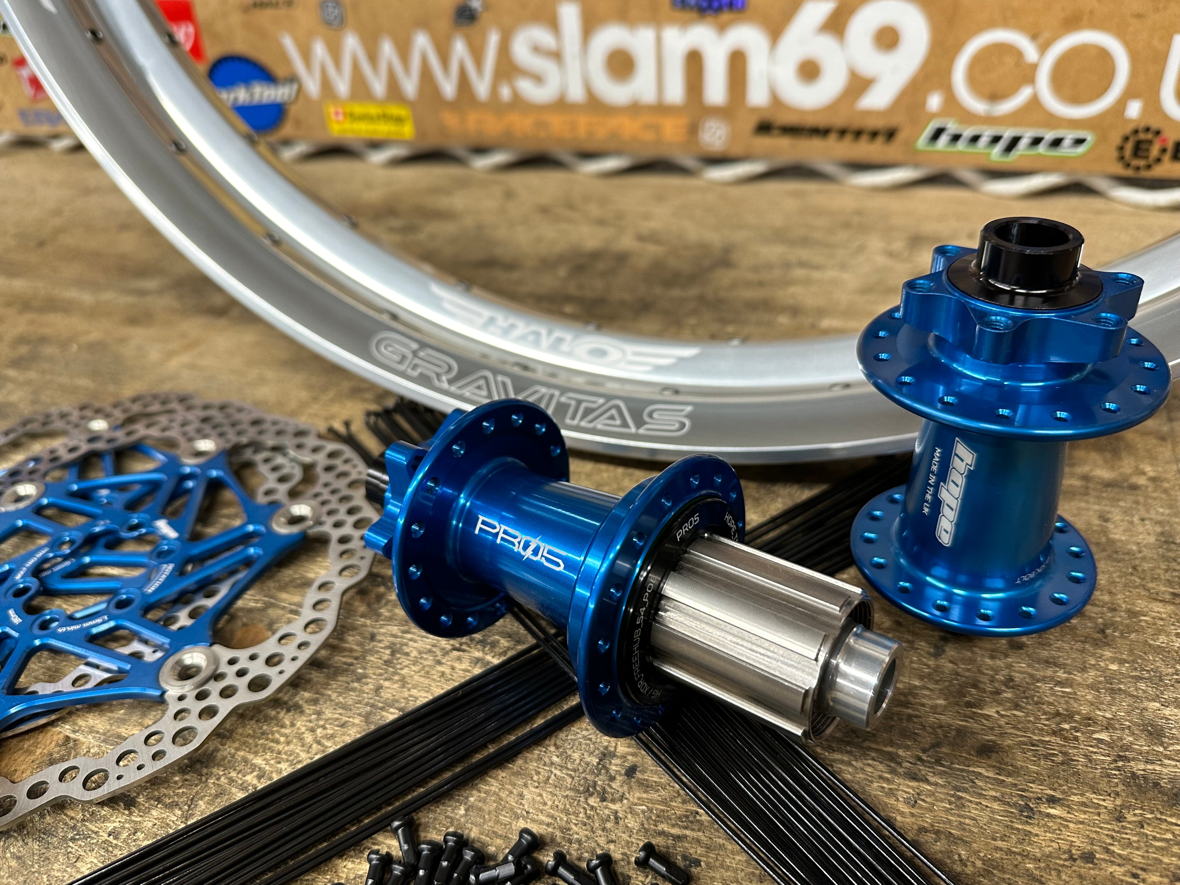 Halo Gravitas Silver Rims with Hope Pro 5 Ebike Hubs in Blue and matching blue floating hope rotors